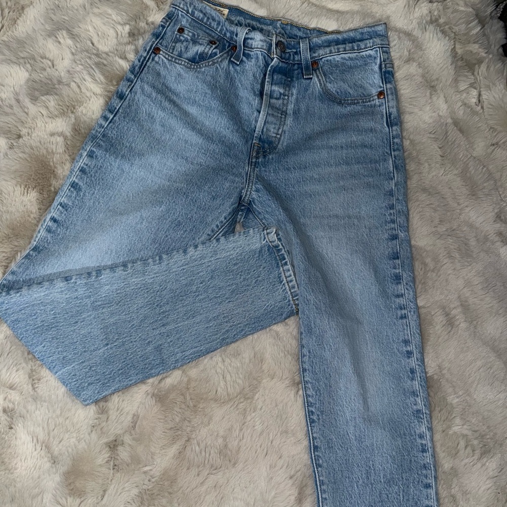 Levi’s 501 s light blue jeans